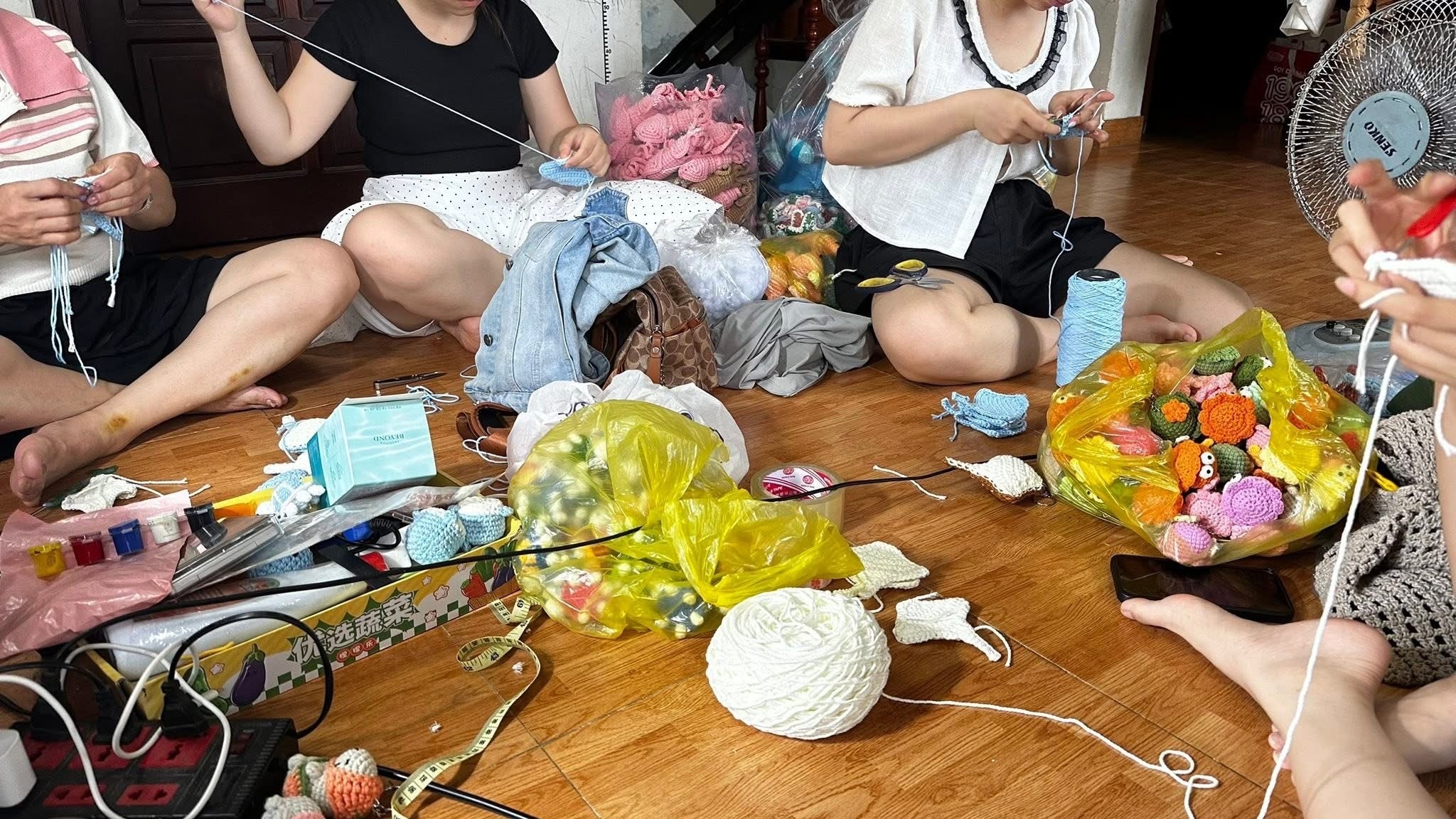 Our dedicated artisans hand-crafting crochet products in our workshop.